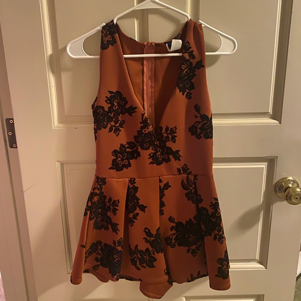 Orange and black romper